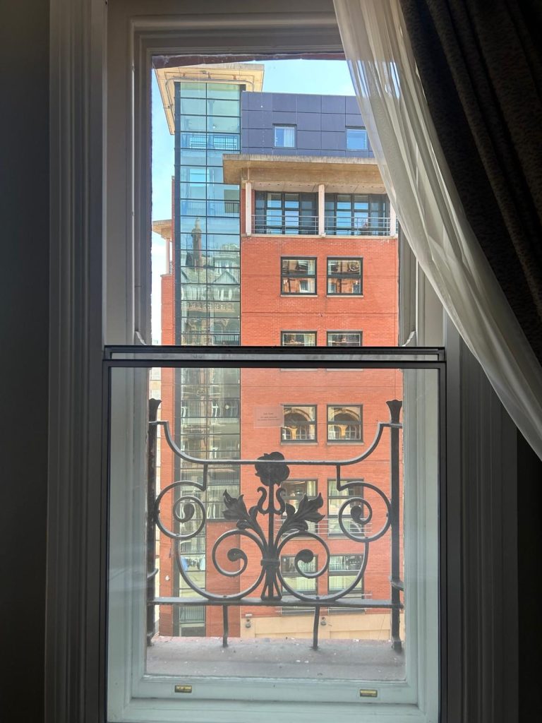 Vertical sliding secondary glazing fitted inside a period sash window